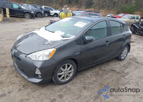 2013 Toyota Prius C Four from USA, damaged, VIN JTDKDTB36D1528857